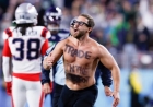 Super Bowl streaker displaying cryptic message taken down by New England Patriots star