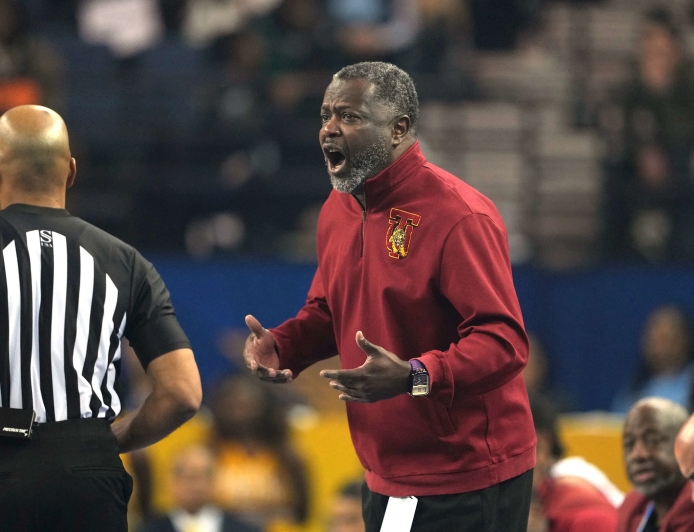 Tuskegee coach Benjy Taylor 'at a loss for words' after being escorted off court in handcuffs